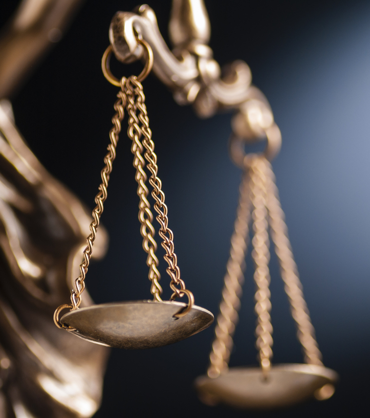 Close up on the scales of justice